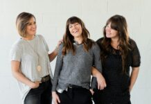 갱년기 증상 완화와 호르몬 건강 지키는 생활습관과 관리법 3 women smiling and standing beside white wall