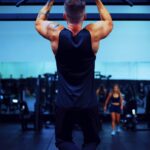 “근육 건강, 일상 속 작은 변화로 챙긴다…집에서 시작하는 근육 지키기 루틴” man in black t-shirt and black pants doing exercise