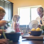 집에서 즐기는 슬로우 스포츠, 한국인 삶을 바꾼다 Grandfather and grandchildren prepare food in kitchen